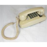 Cortelco 255409-VBA-20M Ivory Mini Wall Phone with Volume Control